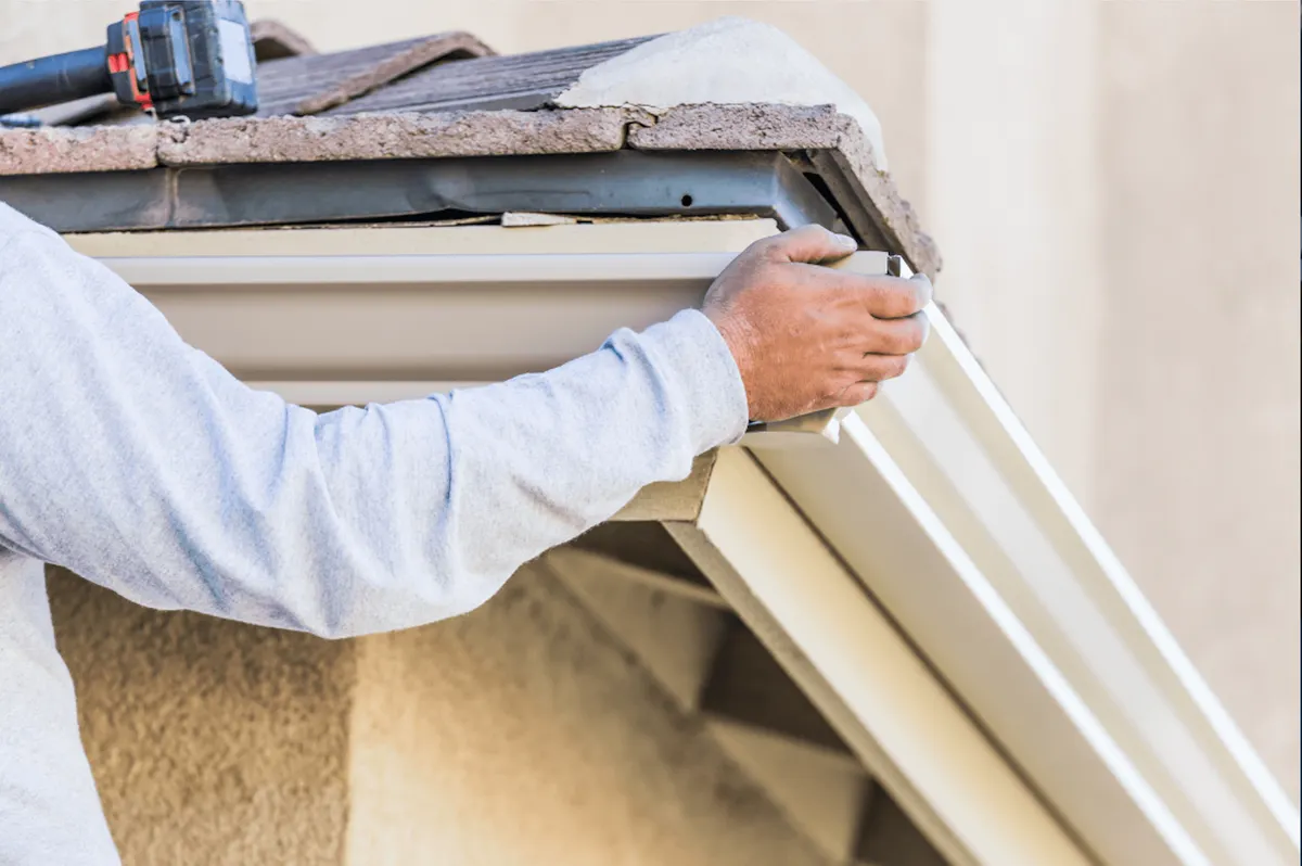 Close-up of hurricane-rated gutter hanger installation